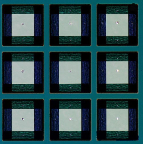 A sample extract. The white dots in the middle of the light squares are holes formed after treating the layer with an X-ray pulse. A sample extract. The white dots in the middle of the light squares are holes formed after treating the layer with an X-ray pulse.